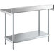 A Regency stainless steel work table with a shelf.
