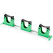 A green and black plastic Unger Hang Up Tool Holder with three clips.
