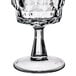 An Arcoroc Artic wine glass with a diamond pattern on the base.
