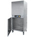 A large stainless steel Excalibur dehydrator with a door open.