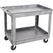 A gray Lakeside plastic utility cart with two shelves and wheels.