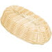 A Thunder Group natural-colored rattan oblong bread basket.