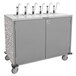 A grey stainless steel Lakeside serving cart with six metal pumps.