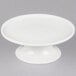 An American Metalcraft white porcelain cake stand with a pedestal.