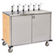 A Lakeside stainless steel condiment cart with wood accents and 12 pumps.