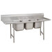 An Advance Tabco stainless steel 3 compartment sink with two drainboards.