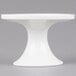A white porcelain American Metalcraft cake stand with a small pedestal on top.
