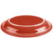 A red platter with a white border.