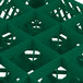 A green plastic basket with 16 compartments and many holes.