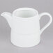 A white teapot with a handle and cover.