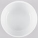 An Arcoroc white bowl on a white background.