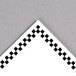 A white rectangular paper deli tag with a black and white checkered corner.