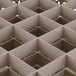 A close up of a Vollrath beige 25-compartment glass rack grid.