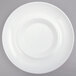 A close-up of a white porcelain Tao bowl with a white rim.