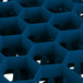 A blue plastic container with holes in a hexagon pattern.