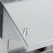 A stainless steel APW Wyott stationary steam table with a sealed well on a metal counter.