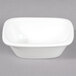 A white rectangular porcelain bowl with a lid.