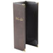 A brown leather Menu Solutions Royal Select menu cover with gold trim.