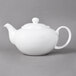 A 10 Strawberry Street Whittier white porcelain teapot with a handle.