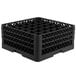 A black plastic Vollrath Traex glass rack with compartments.