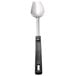 A close-up of a black and silver Vollrath 3-sided solid basting spoon with a Grip 'N Serv® handle.