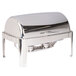 A Vollrath stainless steel chafer with a roll top lid and legs.