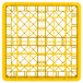 A yellow plastic Vollrath Traex glass rack grid with 36 compartments.