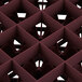 A close-up of a Vollrath Traex burgundy glass rack grid.