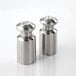 An American Metalcraft stainless steel salt and pepper shaker set on a white surface.