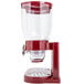 A red and white Zevro double dry food dispenser with clear lids.