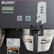A Bunn BrewWISE commercial coffee machine with a label.
