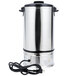 A stainless steel Town water boiler with a black lid and cord.