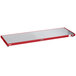 A red and silver rectangular Hatco heated shelf warmer on a table.