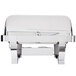 A silver Vollrath Orion Retractable Chafer with a lid.