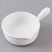 An American Metalcraft mini ceramic fry pan with a handle on a white background.