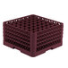 A burgundy plastic Vollrath Traex glass rack with many compartments.