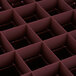 A close up of the grid of a Vollrath Traex burgundy glass rack.