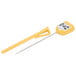 A yellow Taylor digital pocket probe thermometer with a long handle.