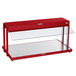 A red Hatco countertop buffet warmer with glass shelves.