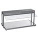 A grey metal Hatco buffet warmer with glass shelves.
