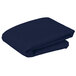 A folded navy blue table cover on a white background.