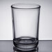 A Libbey clear glass tumbler on a table.