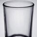A close up of a clear Libbey Puebla tumbler with a small black rim.