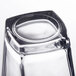 A close up of a clear Arcoroc Prysm drinking glass.