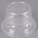 A clear plastic Fabri-Kal sundae cup with a clear plastic dome lid.