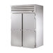 A large stainless steel True Spec Series roll-in freezer with two solid doors.