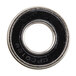 A black and silver metal bearing with a metal ring.