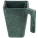 A green plastic pitcher with a handle.