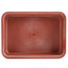 A red plastic rectangular tray with a red center and a lid.