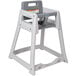 A Koala Kare grey plastic high chair with grey accents.